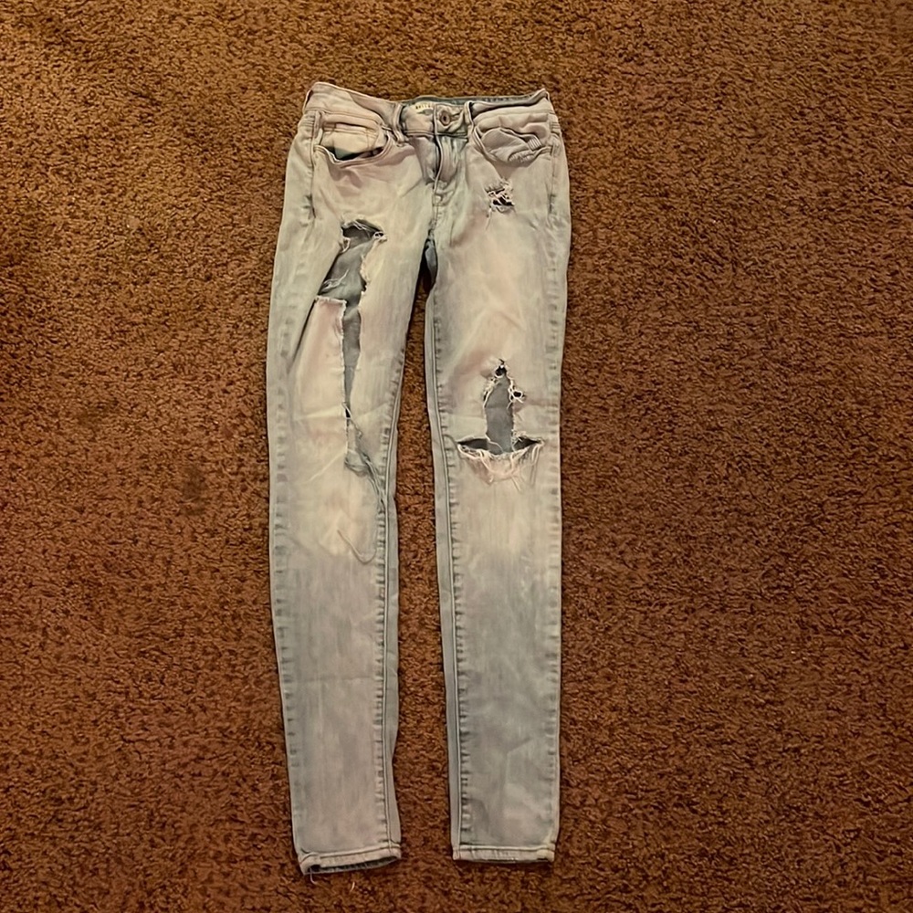 Denim pants with holes